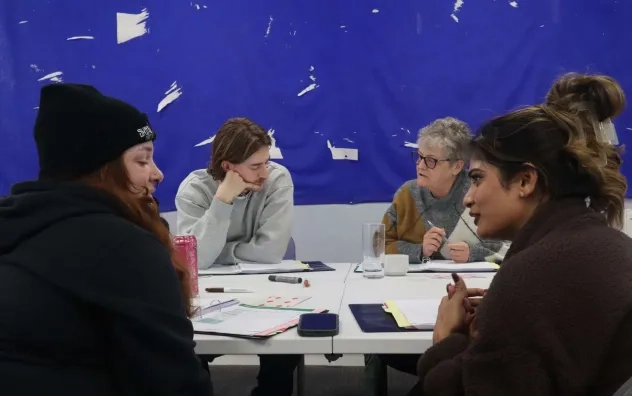 Lead programme participants discuss tasks